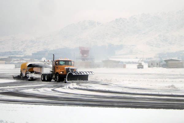 Snowplow clearing the runways of Kabul International Airport
